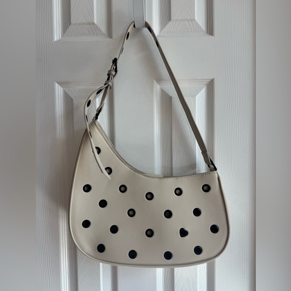 Betsey Johnson Handbags - BETSEY JOHNSON Xorothy Shoulder Bag Cream Black Grommets